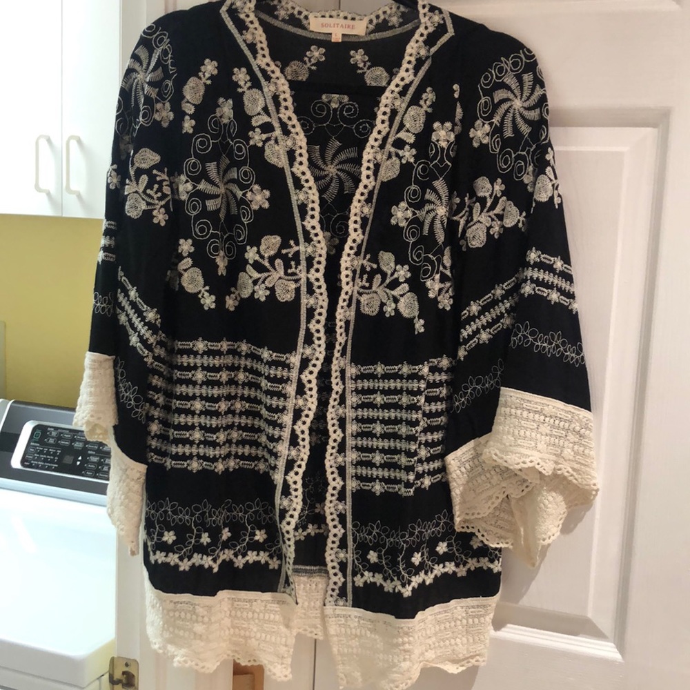 Loose fitting beautiful jacket size Large.